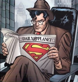 Clark Reading the Daily Planet